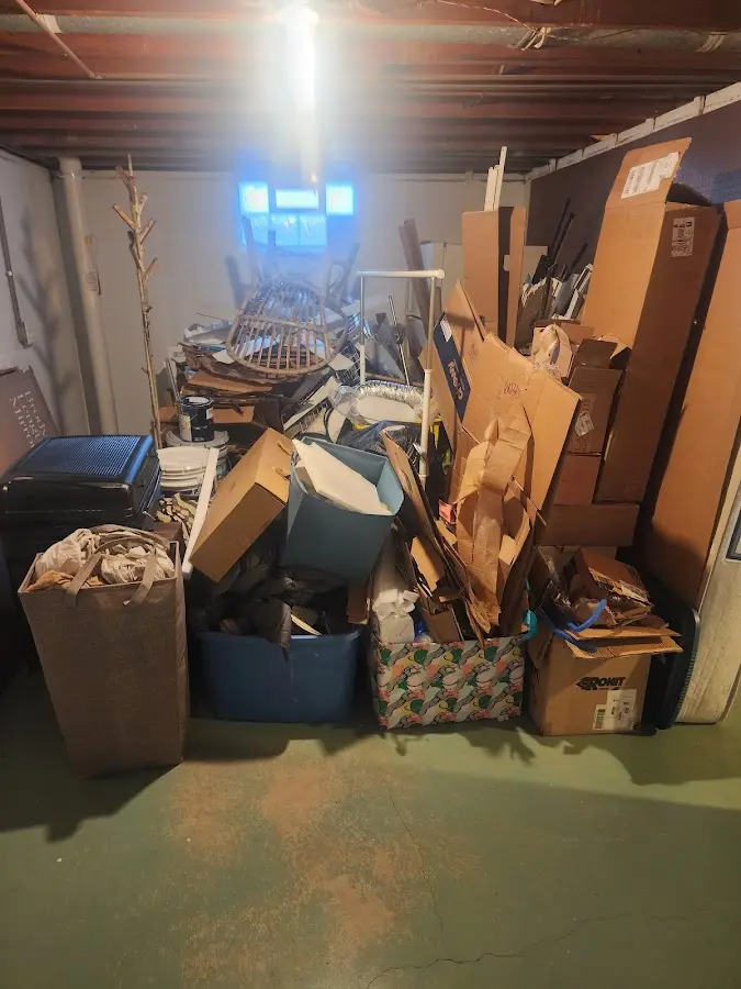 Roll-off dumpster container at job site for 15 Yard Dumpster Rental in Onalaska